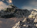 Snowy mountain peak and low clouds. Royalty Free Stock Photo