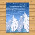 Snowy mountain peaks and falling snow.