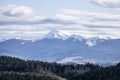 snowy mountain peaks on a sunny day at a ski resort. Royalty Free Stock Photo