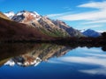 Snowy mountain range reflecting in Argentinian lake. Royalty Free Stock Photo