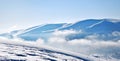 Snowy mountain ridges Royalty Free Stock Photo