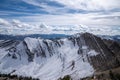 Snowy mountain ridges in the Bridger-Teton National Forest of Wyoming, on a summit Royalty Free Stock Photo