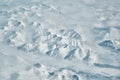 Snowy arctic mountain ridges and river valley scenic aerial landscape on sunny winter day Royalty Free Stock Photo