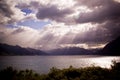 Snowy mountainous landscape of the New Zealand alps with dramatic skies, during a motorhome trip. Royalty Free Stock Photo