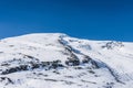 Snowy mountains with blue sky Royalty Free Stock Photo