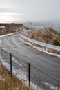 Snowy mountainside road