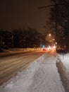 Snowy Neighborhood at Night