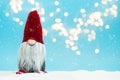 Snowy noel gnome & x28;elf& x29; background. Christmas greating card. Christmas or New Year celebration concept. Copy space