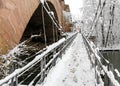 Snowy Nuremberg, Germany- iron bridge ( Kettensteg), old town city walls Royalty Free Stock Photo