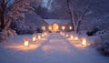 A snowy path lined with glowing luminaries leading to a warm home. Royalty Free Stock Photo