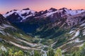 Snowy peak and green vally