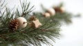 snowy pine branches with tiny bells and wooden stars . Royalty Free Stock Photo