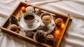 Snowy Pine Tree Cones, Cups, Cakes and Dry Citrus on Wooden Tray. Christmas Decoration, Aromatic Cinnamon, Empty Mugs and Sweet