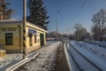 Snowy railway stop with platform near Ceske Budejovice city