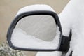 Snowy rear mirror Royalty Free Stock Photo