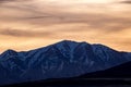 Snowy ridgeline in the Rocky Mountains at sunset