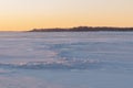 On the snowy riverbank landscape. Winter snow scene. Winter river in snow Royalty Free Stock Photo