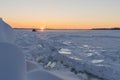 On the snowy riverbank landscape. Winter snow scene. Winter river in snow Royalty Free Stock Photo