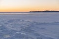 On the snowy riverbank landscape. Winter snow scene. Winter river in snow Royalty Free Stock Photo