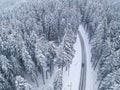 Snowy road with a car top view Royalty Free Stock Photo