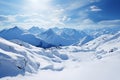 Snowy road between majestic mountains. Isolated frosty mountain pass. Stones covered with snow. Winter landscape