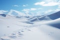 Snowy road between majestic mountains. Isolated frosty mountain pass. Stones covered with snow. Winter landscape