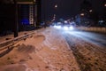 Snowy road with night traffic. City night. Royalty Free Stock Photo