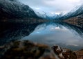 Snowy rocky mountains are well visible. Royalty Free Stock Photo