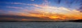 Snowy russian field during fiery sunset