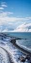 Snow On The Road In Iceland: Calm Waters And Coastal Views