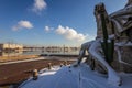 Snowy sculpture of Rostral column and Neva river cityscape Royalty Free Stock Photo