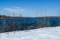 Snowy shore of Glienicke lake on Havel river