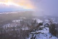 Snowy stony hill. Mountain top in winter Royalty Free Stock Photo