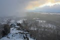 Snowy stony hill. Mountain top in winter Royalty Free Stock Photo