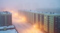 Snowy street and gloomy residential buildings that look almost abandoned. Northern city during snowstorm. Generative AI