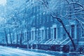 Snowy street scene of historic buildings along Washington Square in New York City Royalty Free Stock Photo