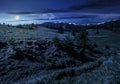 Snowy tops of carpathians in springtime at night Royalty Free Stock Photo