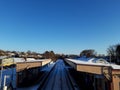 A snowy train station with the horizon