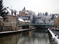 Snowy view on the Briare canal and the castle of Montargis