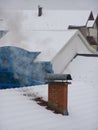 Snowy village roofs