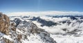 Snowy white Alpine mountain range in summer time on Zugspitze, top of Germany Royalty Free Stock Photo