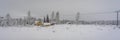 Snowy winter background of northern village in Sweden. Traditional scandinavian wooden houses covered with deep white snow. Power Royalty Free Stock Photo