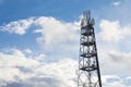 Snowy winter country with transmitters and aerials on telecommunication tower Royalty Free Stock Photo