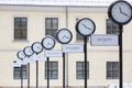 Snowy winter in Krakow, Holy Ghost Square, clocks showing the current time in different cities around the world, Krakow, Poland
