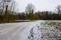 Snowy winter landscape with a crooked road through it in Rivierenhof 2100 Deurne, Belgium