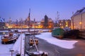 Snowy winter in the old town of Gdansk with frozen Motlawa river, Poland