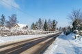 Snowy winter road in Juszkowo, Poland Royalty Free Stock Photo