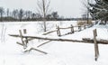 Snowy Winter scene cedar fence Royalty Free Stock Photo