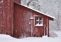 Snowy winter scene of an old shed