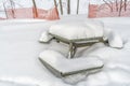 Snowy Winter scene picnic table Royalty Free Stock Photo